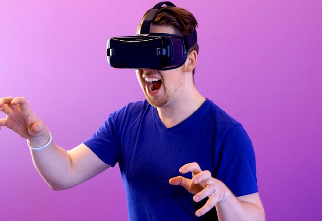 a guy having VR device on his head